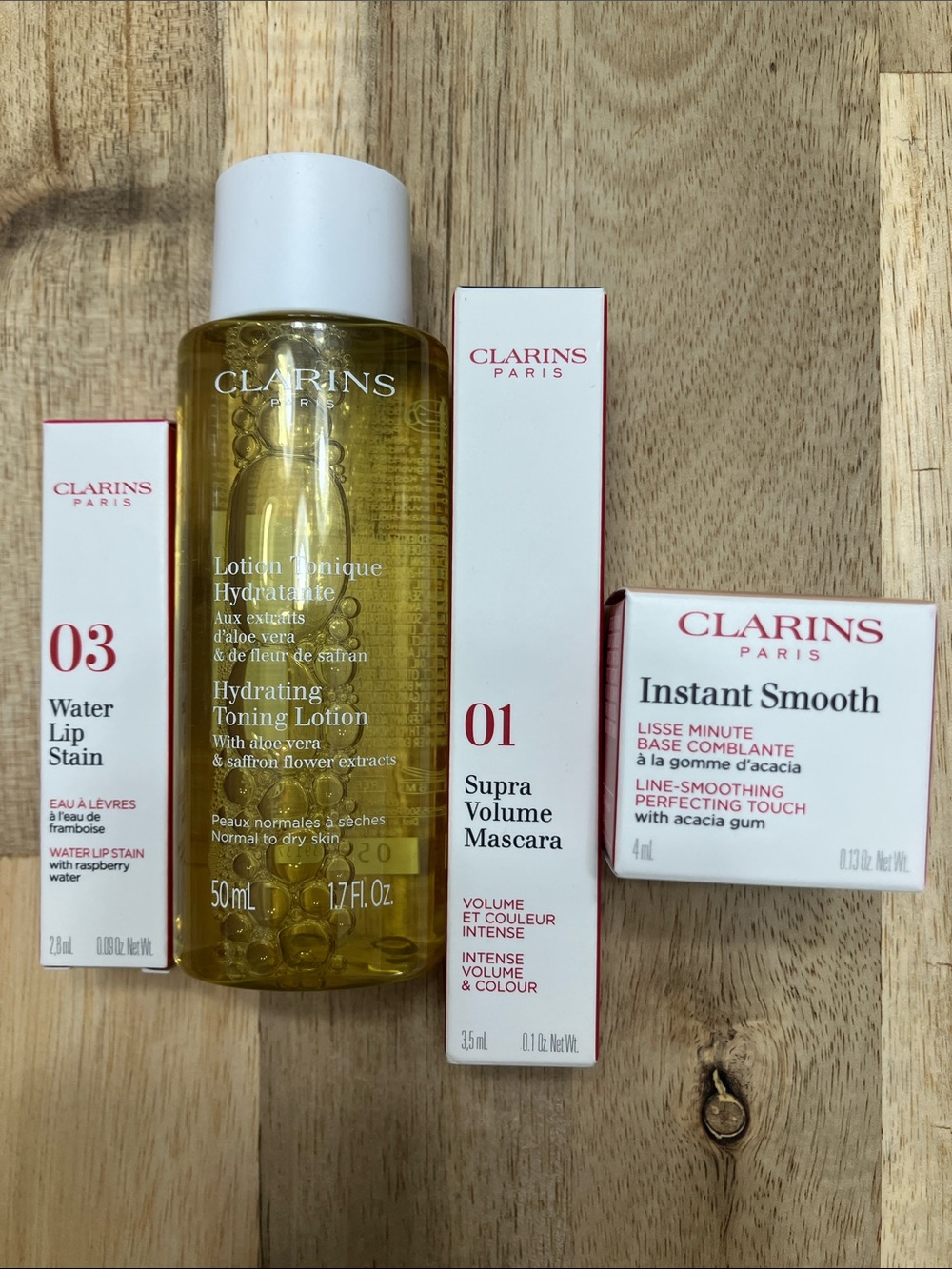 NWT Clarins Sample Bundle - Mascara, Instant Smooth, Toning Lotion, & Lip Stain - Picture 6 of 6